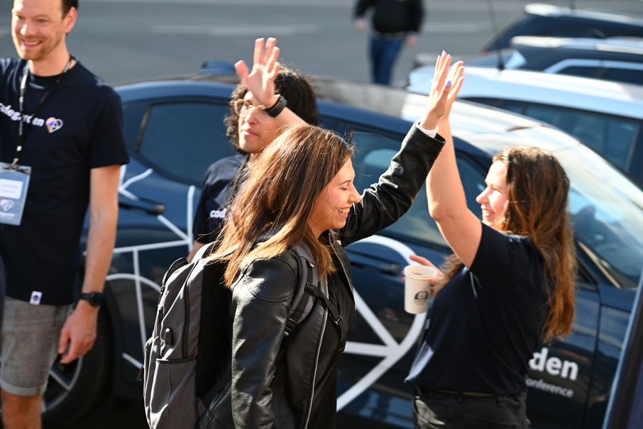 People high five'ing at Codegarden